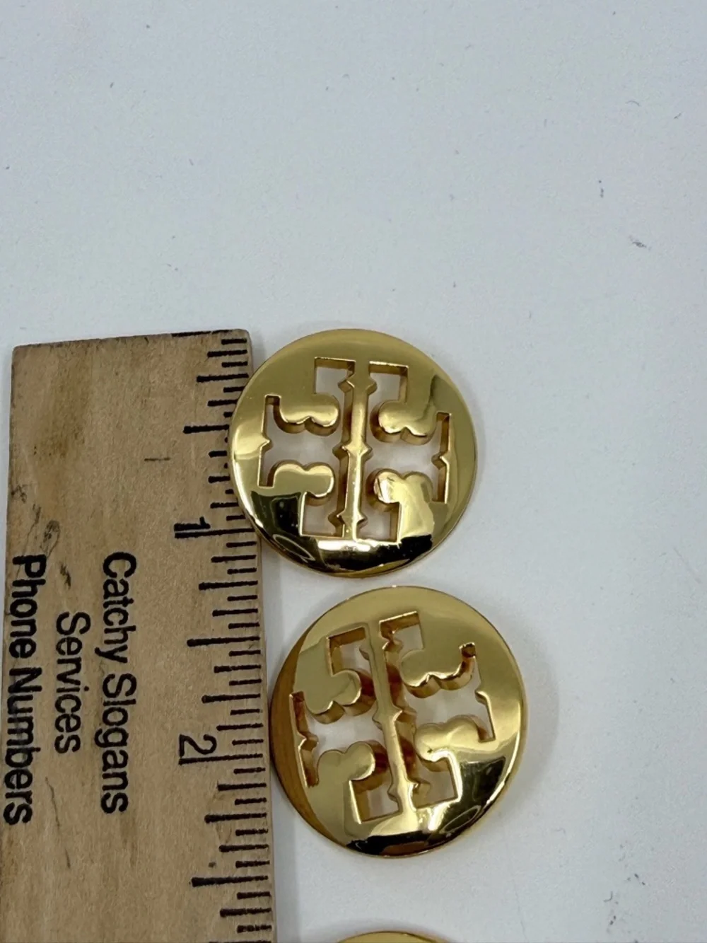 Five Gold Finish Tory Burch Buttons
